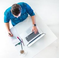 sitting -on a -computer-indianbureaucracy