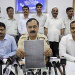 Thane Crime Branch officials show a examination paper of the Army Recruitment Board that was allegedly leaked
