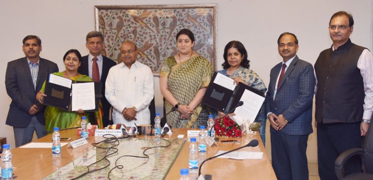 Smriti Irani signing ceremony -Indian Bureaucracy