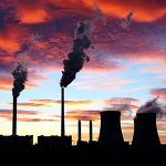 dramatic sunset on the sky and coal power plant factory