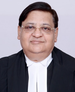 Former Justice Bharat Bhushan