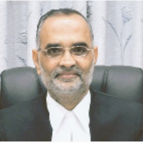 Justice Dhirubhai Naranbhai Patel