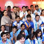 Sports Minister receives the Special Olympics Torch from Chairman SOIFC