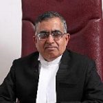 R K Gauba Judge