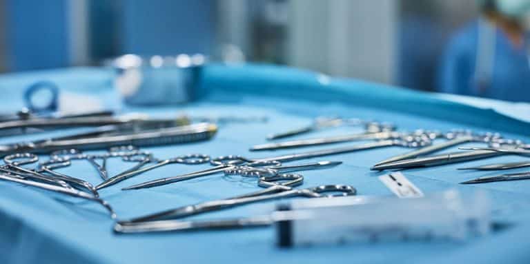 Close-up of surgical instruments on medical tray