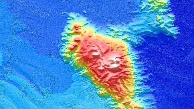 Sinking sea mountains make and muffle earthquakes
