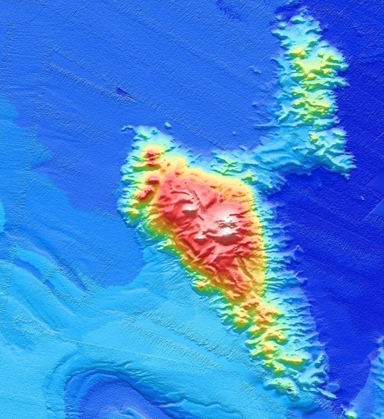 Sinking sea mountains make and muffle earthquakes