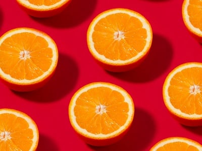 Orange Fruit Pattern on Red Background