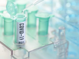Corona virus: vial with pipette in laboratory