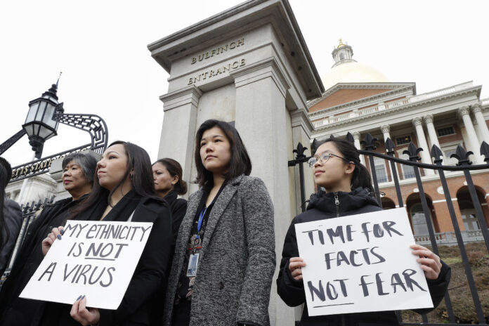 Virus Outbreak Asian Americans Protest