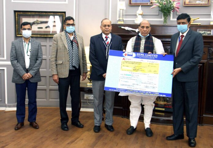 Amit Banerjee, CMD, BEML handed over the cheque to Shri Rajnath Singh