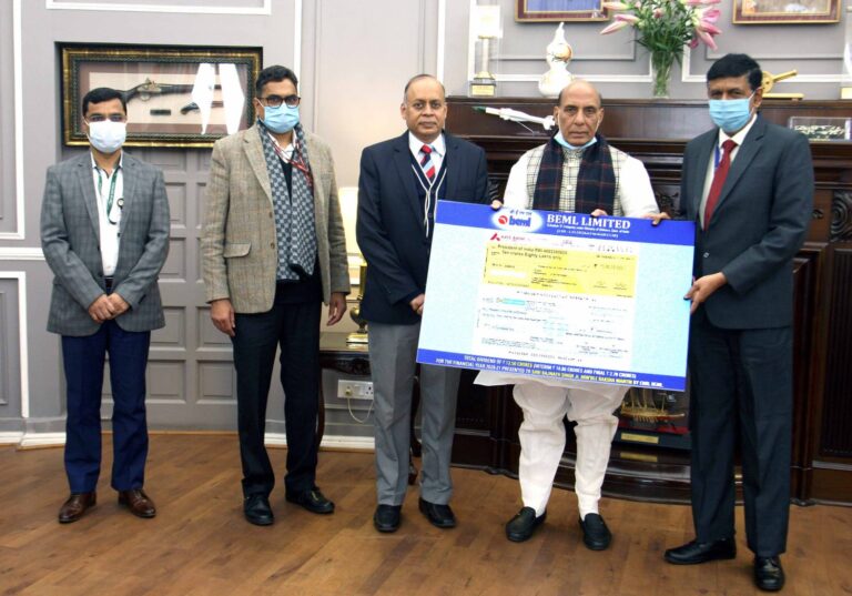 Amit Banerjee, CMD, BEML handed over the cheque to Shri Rajnath Singh