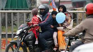 safety measures for children below four years of age, riding or being carried on a motor cycle