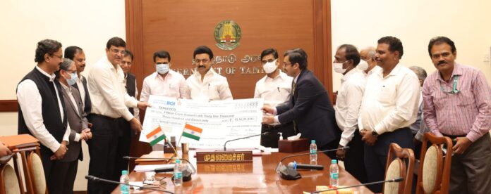 Handing over Dividend to Tamil Nadu Chief Minister,