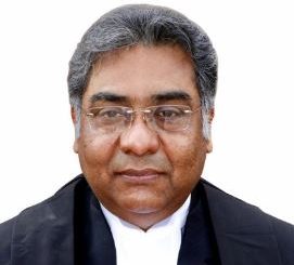 Justice Manindra Mohan Shrivastava